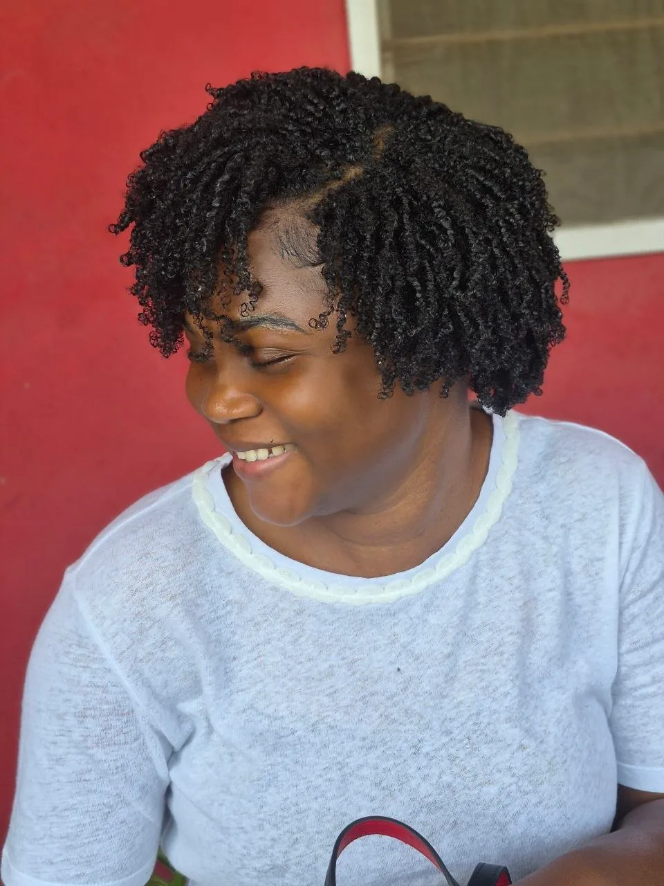 Finished hairstyle created at Signature Curls & Beauty